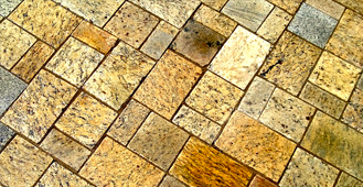 Encore Granite Pavers vs Travertine Pavers